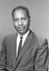 Portrait de Walter Samuel McAfee, physicien afro-américain pionnier de l’économie spatiale.